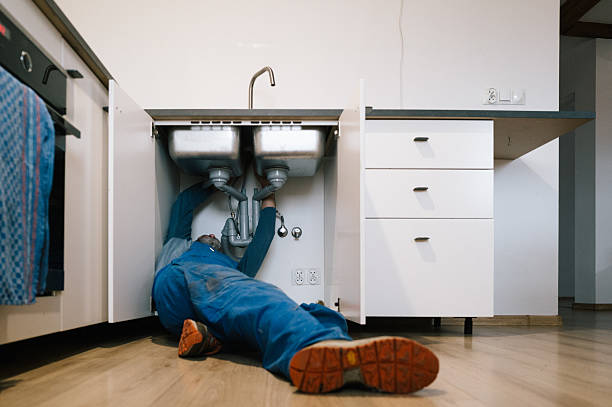 Professional Emergency Plumber technician working in Rockville, MD